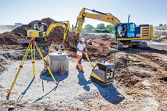 Foto Lernender auf der Baustelle